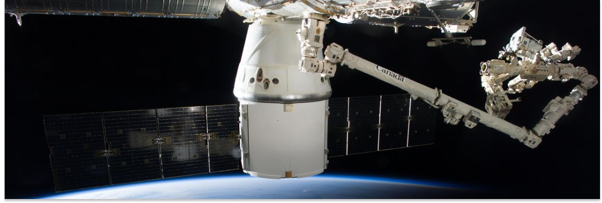 A view of the removal of the RapidScat Nadir Adapter from the SpaceX-4 Dragon trunk and installation of the adapter onto the Columbus Exposed Facility Unit (EFU).